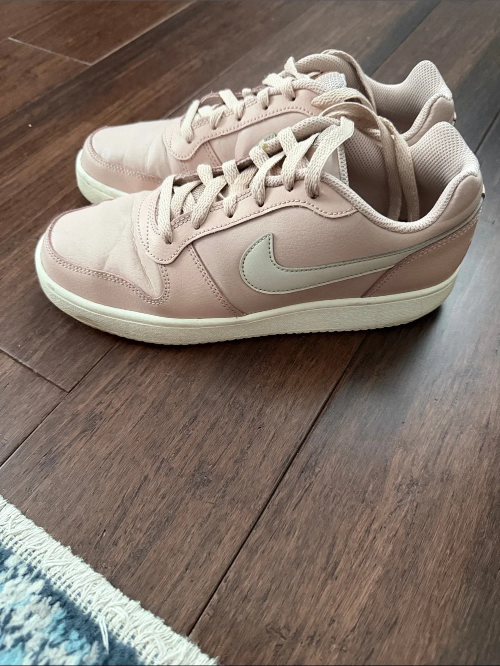 Nike Women's Blush Pink Low-Top Sneakers with Cream Swoosh